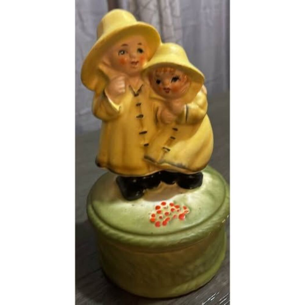 Vintage Ceramic Music Box Children in Yellow Raincoats